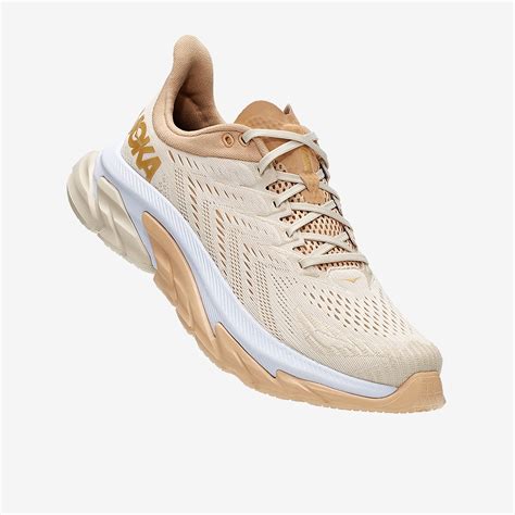 beige hoka shoes for women.